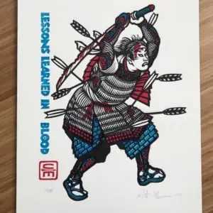 A Samurai, shot with seven arrows, holds a broken and bloodied sword overhead while he continues battle