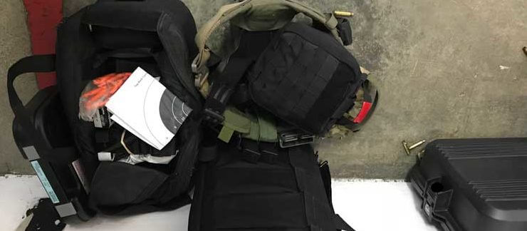 Black range bags all look the same, this one has the medical gear marked with red duct tape