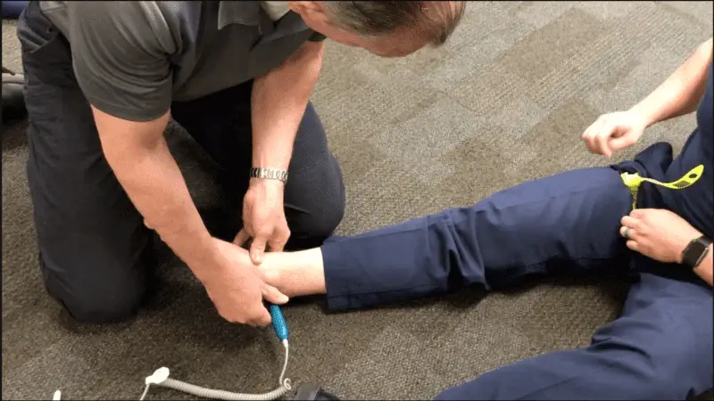 a second photo showing one of the 21 failed applications of the STAT tourniquet, as proven by doppler ultrasound