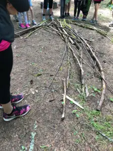 A rescue arrow made in training from sticks to alter potential rescuers