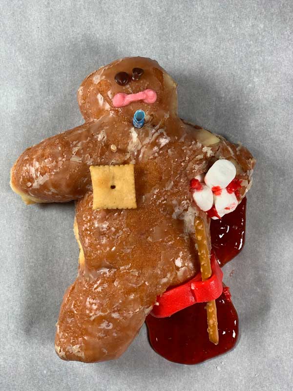The Critically Injured Little Dough Boy was struggling to breathe & so had a cocktail toothpick to deflate his dough and a vented Cheeze-it chest seal.