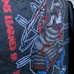 Image of the CM Samurai on our new, limited edition poncho liners