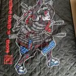 Crisis Medicine custom poncho liner / woobie made in the USA by Woobie USA, emblazoned with the Crisis Medicine's Samurai logo