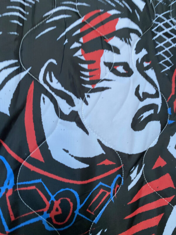 A close up of the face on our CM Samurai on our new, limited edition poncho liners