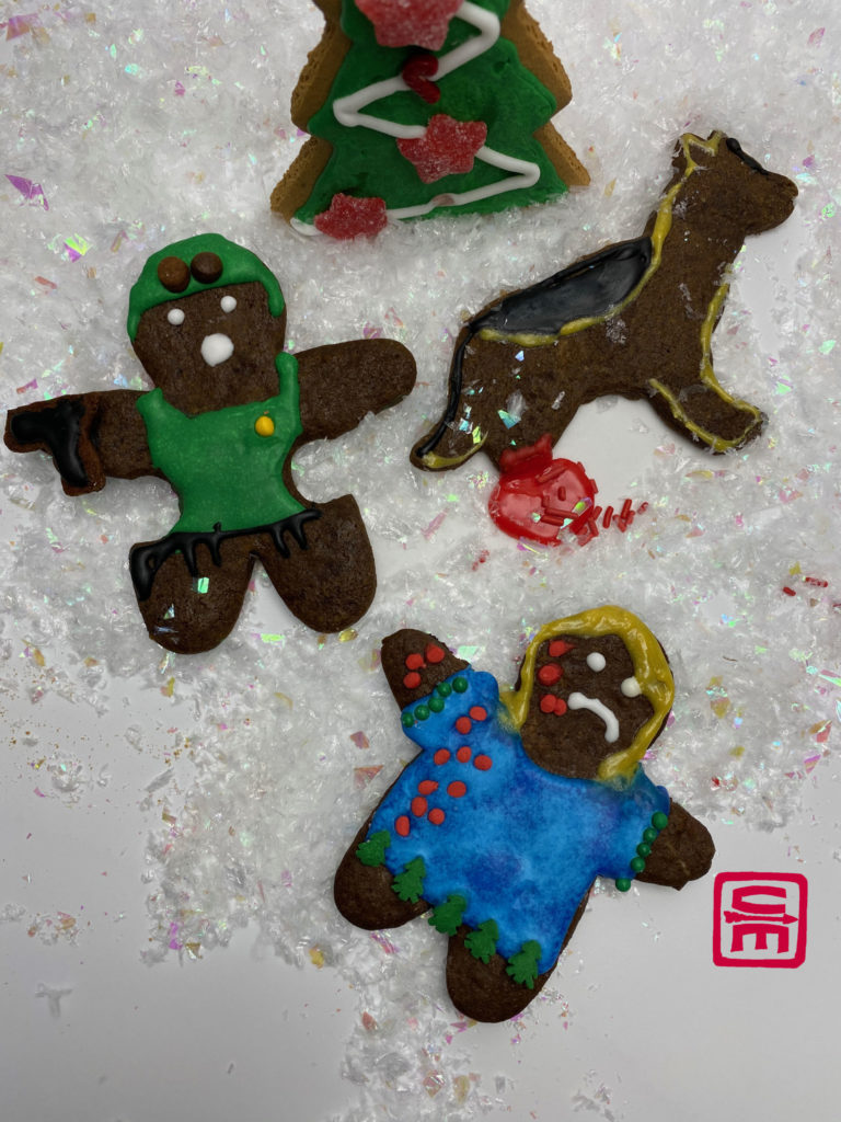 The second group of wounded gingerbread includes a passerby with shrapnel wounds, a SWAT officer with blast lung, and an LEO K9 with an amputated leg.
