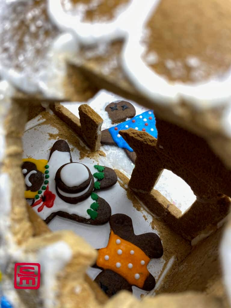 The gingerbread family is wounded in the explosion, as is the neighbor.