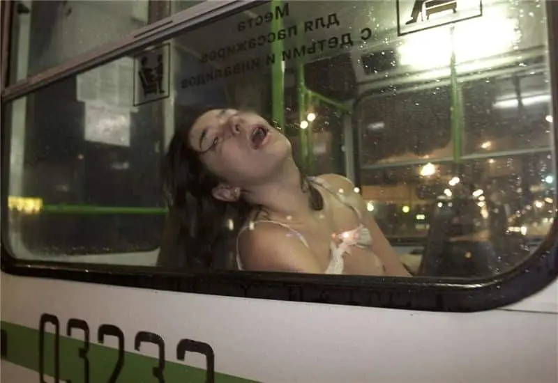 A victim of the Dubrovka Theater hostage crisis in 2002 placed on a bus with her head thrown back and her mouth open