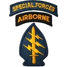 The Special Forces Flash, a Special Forces long tab over an airborne tab, over a spear shaped patch with a gold sword and three lightening bolts