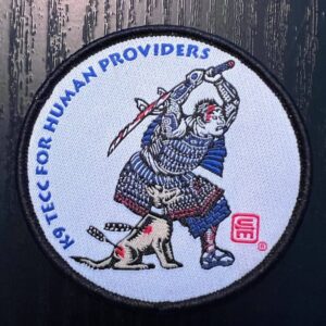 A 3" woven patch with merrowed edge showing the Crisis Medicine K9 TECC for Human Providers patch