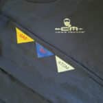 Crisis Medicine Tactical CBRN T-Shirt chest with CM logo and a gas mask, sleeve showing Gas, Bio, Atomic flags