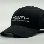 ¾ view of the Crisis Medicine logo'd hat, solid black with the logo embroidered in white