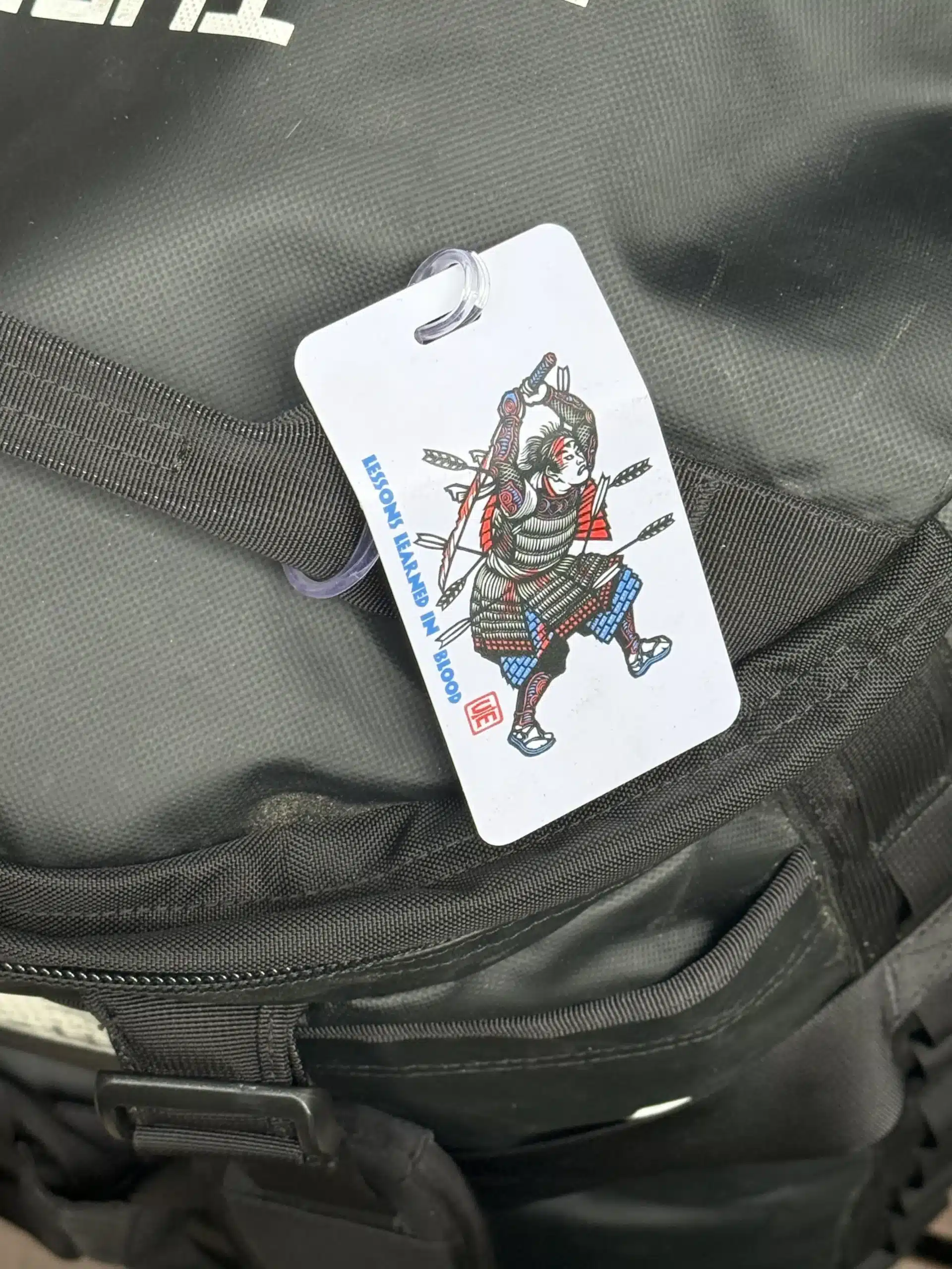 Crisis Medicine Luggage tag on a bag The Crisis Medicine Luggage Tag hanging on luggage