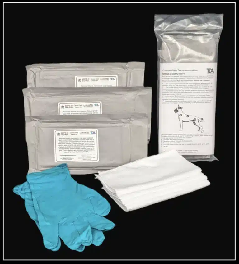 An image showing a K9 CBRN Decon kit, with wipes, gloves, and instructions