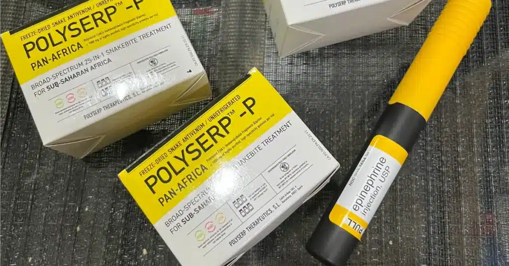 A photograph showing 2 boxes of Polyserp PanAfrica meds and an auto injector
